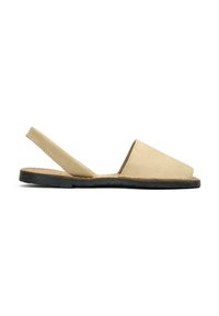 Beige slingback sandal featuring a smooth suede upper, open toe design, and a black rubber sole with minimal tread.