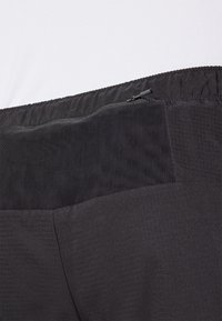 The North Face SUNRISER 2IN1 SHORT 4IN - Sporta šorti - black