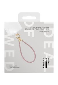 Różowy pasek do telefonu na nadgarstek o teksturowanym, błyszczącym wykończeniu, z złotym okuciem i pętlą ułatwiającą przypięcie.