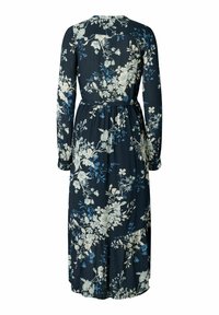 Robe longue fleurie en tissu bleu marine avec manches longues, taille froncée et jupe à volants ornée de motifs floraux crème et bleus.