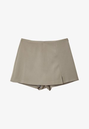Beige Skort mit einem maßgeschneiderten Design, das eine glatte Textur und leichte Seitenschlitze aufweist. Hergestellt aus leichtem Material.
