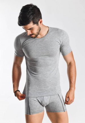 Gray cotton t-shirt with short sleeves, form-fitting design. Paired with matching gray boxers featuring a subtle trim detail.