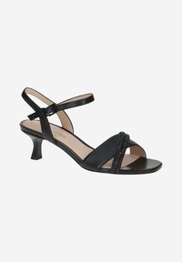 Schwarze High Heels Sandalen mit offener Zehenpartie, featuring schmalen Riemen und einer strukturierten Akzentuierung. Schlanker Absatz und Knöchelriemen mit Schnalle.