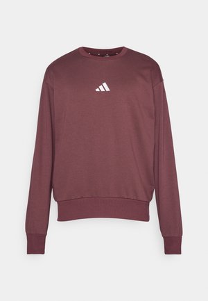 adidas Sportswear ESSENTIALS FEELCOZY - Ikdienas džemperis - aurora ruby/white
