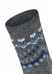 Calzino grigio a maglia con risvolto decorato, caratterizzato da motivi floreali blu chiaro e bianchi, forme geometriche e dettagli di superficie testurizzata.
