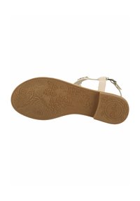 Talpa de sandal cu model floral și de frunze în nuanțe de bej; textură antiderapantă și logo circular; concepută cu curea ajustabilă la gleznă și materiale ușoare.