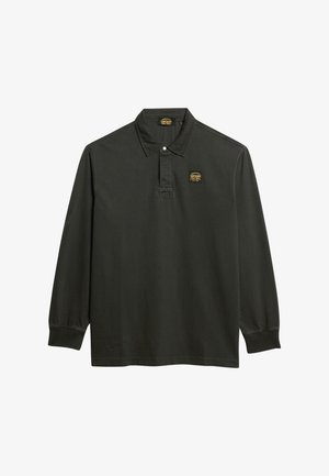 Donkergroene polo met lange mouwen van katoen, voorzien van een kraag, een placket met twee knopen en een klein geel logo op de linkerborst.