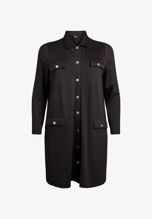 Melna krekla kleita ar garām piedurknēm, pogām priekšā, diviem krūšu kabatām un zelta tonī pogām. Mīksta auduma ar gludu tekstūru.