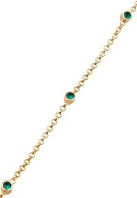 Bracciale in catena d'oro con piccole pietre verdi rotonde incastonate in montature circolari, disposte in modo uniforme nell'elegante design.