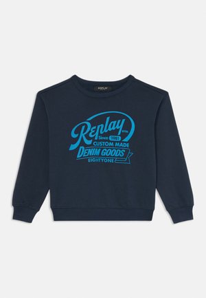 Navy blue sweatshirt featuring a light blue graphic print text, round neckline, and ribbed cuffs and hem. Casual, soft cotton fabric.