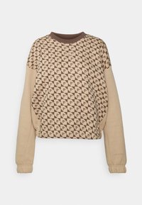 Zkrácená mikina se geometrickým trojúhelníkovým potiskem v hnědé a béžové barvě, vybavená žebrovanými manžetami a límcem, vyrobená z měkkého materiálu.