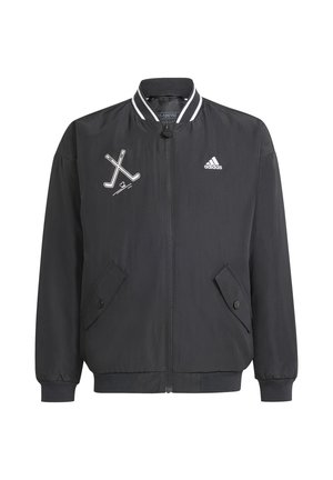 Veste coupe-vent noire avec fermeture éclair, col côtelé et deux poches latérales à boutons-pression. Comprend un logo blanc et un graphique de bâton de hockey.