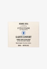 L'Occitane Karité Confort Ultra Rich Body Cream-förpackning, gräddfärgad, har svart text och blå logotyp, volym: 200 ml, 6,9 oz.