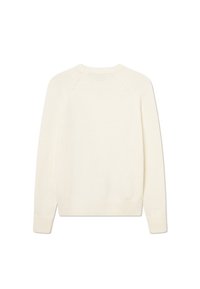 Gräddfärgad tröja, mjuk textur, långa ärmar, ribbade mudd och nederkant, rund halsringning och raglanärmar med subtila sömdetaljer.