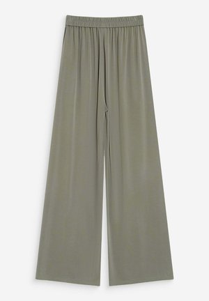 Pantalones de tiro holgado y pierna ancha en verde oliva con cintura elástica, hechos de una tela ligera y suave.