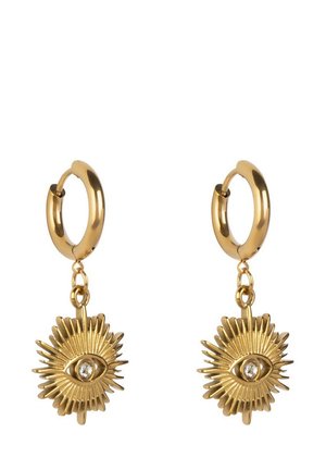 Guldörhängen med en solstråle-design som har ett öga-motiv och en central rhinestone. Slät yta med intrikata detaljer.