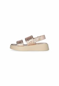 Strappy sandal with metallic rose gold upper, textured straps, and a light cream platform sole. Adjustable ankle strap included.