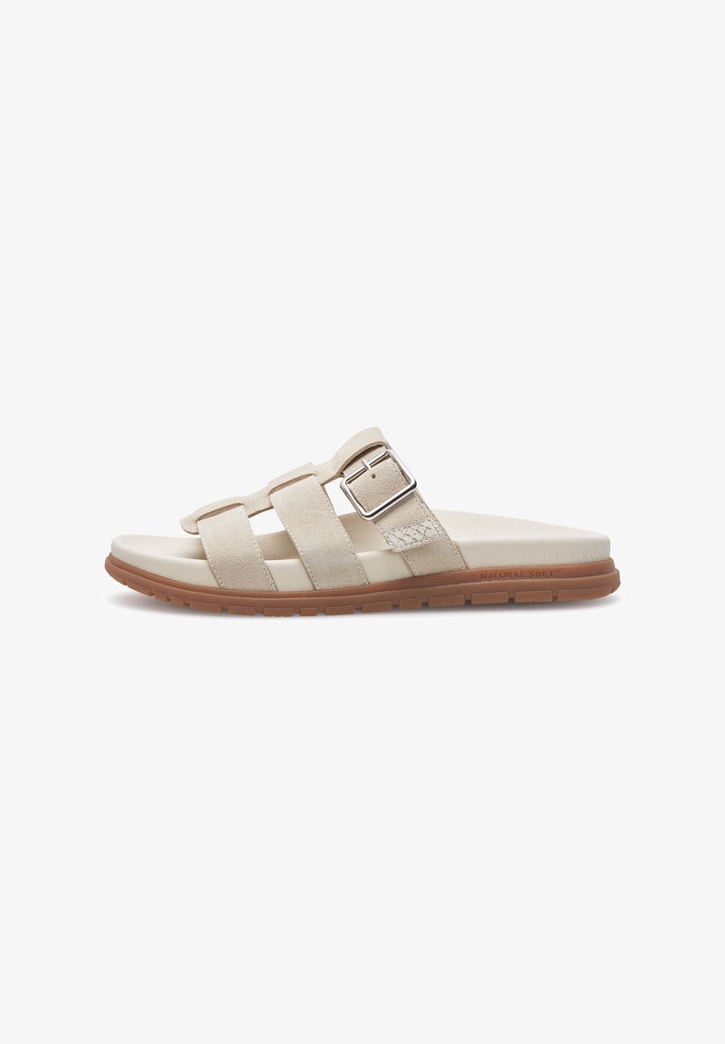 Beige sandal with two suede straps and a metallic buckle. Features a light-colored cushioned footbed and a textured, durable rubber sole.