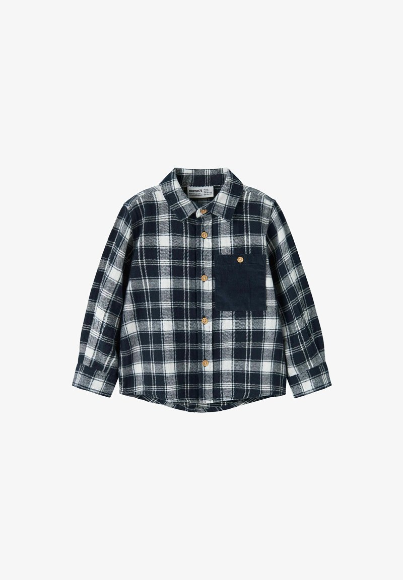 Jūrinės ir baltos spalvos languota marškinė su ilgomis rankovėmis, mygtuko uždarymu ir krūtine kišene. Pagaminta iš minkštos medžiagos, su laisvu siluetu.