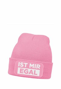 Pink knit beanie with textured ribbed design. Features a white rectangular patch with the text "IST MIR EGAL" prominently displayed.