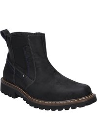 Schwarze Lederstiefelette mit elastischen Seitenteilen, hellgrauer Naht, strukturiertem Gummisohle und kleiner Schlaufe hinten.