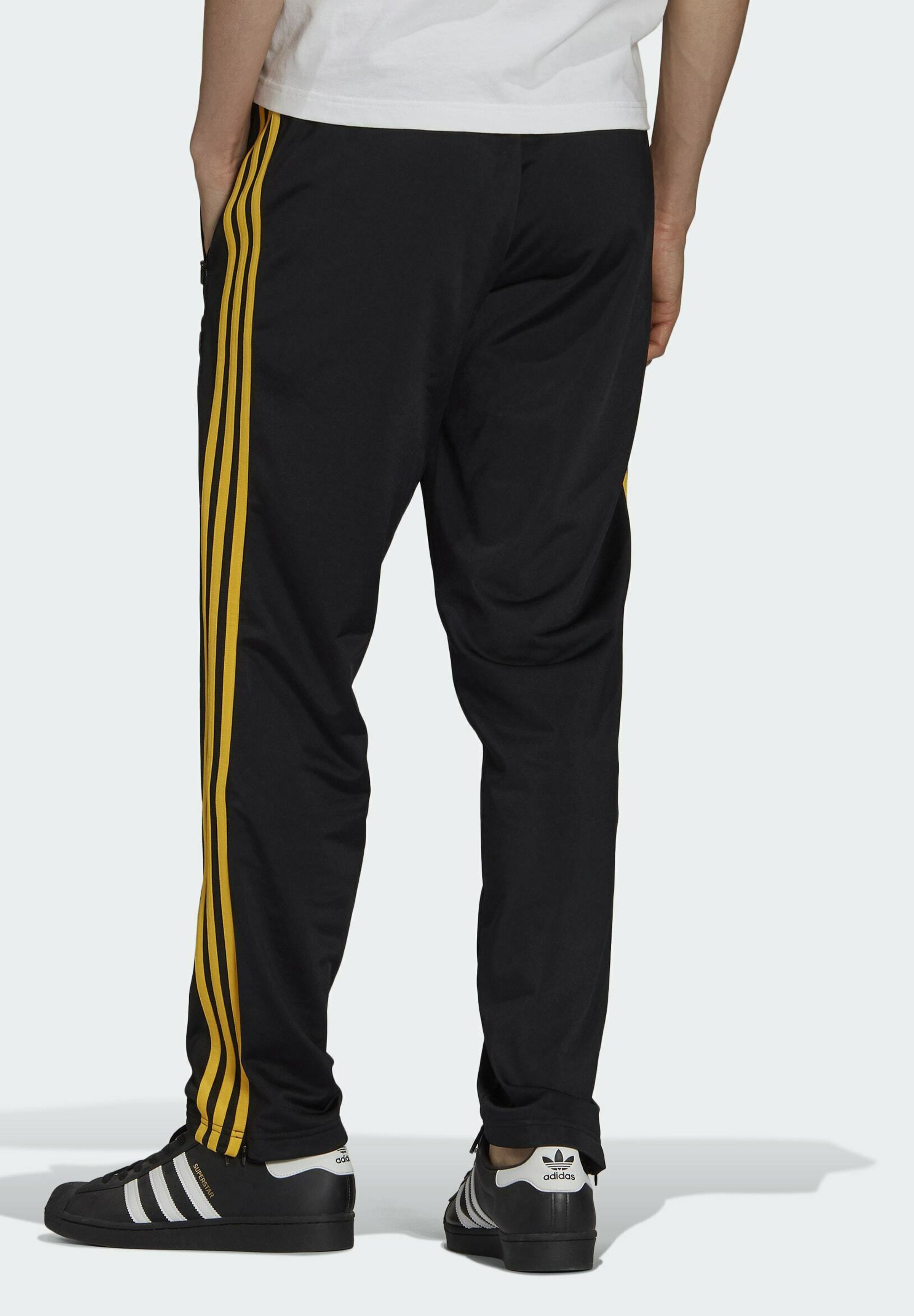 adidas originals black and gold tracksuit