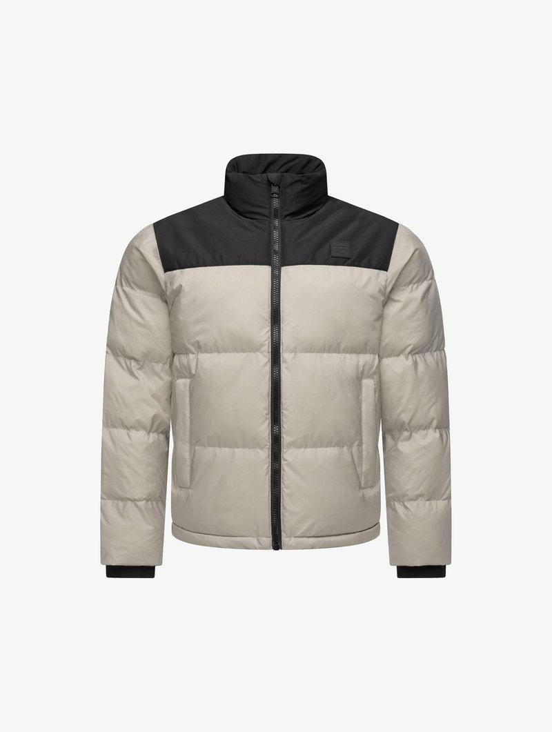 Puffjacka med en beige kropp och en svart övre del, med hög krage, långa ärmar och dragkedja framtill. Texturerat tyg med quiltat mönster.