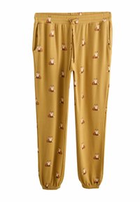 Yellow joggers made of soft fabric featuring a repeated pattern of sitting foxes, with elasticated cuffs and side pockets.