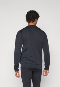 New Balance TECH CREW - Felpa - black