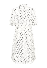 Robe blanche à manches courtes avec petits pois noirs, un col et une jupe légèrement évasée, vue de dos.