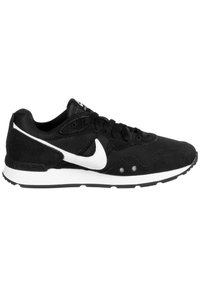 Black athletic shoe with mesh and suede materials, featuring a white Nike swoosh, black laces, and a white midsole with a textured outsole.