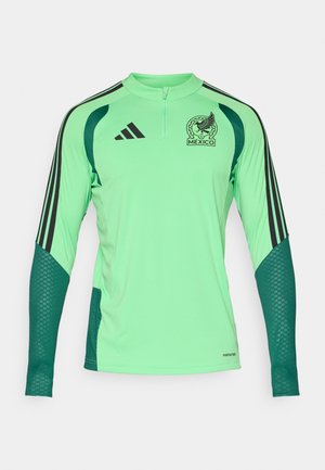 Dlhý rukáv svetlozelené športové tričko s tmavozelenými sieťovanými rukávmi, čiernym logom Adidas, emblémom mexickej futbalovej reprezentácie a krátkym predným zipsom.