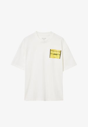 White cotton t-shirt with a round neckline and short sleeves. Features a yellow graphic pocket design with text on the left side.