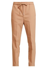 Tan, lätta byxor med elastisk midja, dragsko-stängning och sidofickor. Har rena linjer och en avsmalnande passform.