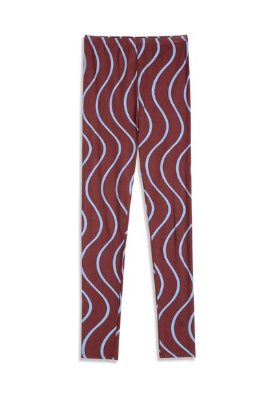 Legging avec une couleur de base marron et un motif répétitif de lignes ondulées bleu clair, avec une taille élastique et une coupe ajustée.