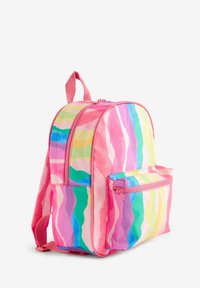 Colorful pink backpack with multicolored wavy stripes. Features a front zipper pocket and double shoulder straps. Made of durable fabric.