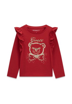 T-shirt rouge à manches longues pour tout-petits avec détails à volants aux épaules et motif visage d'ours en sequins dorés avec nœud sur le devant.
