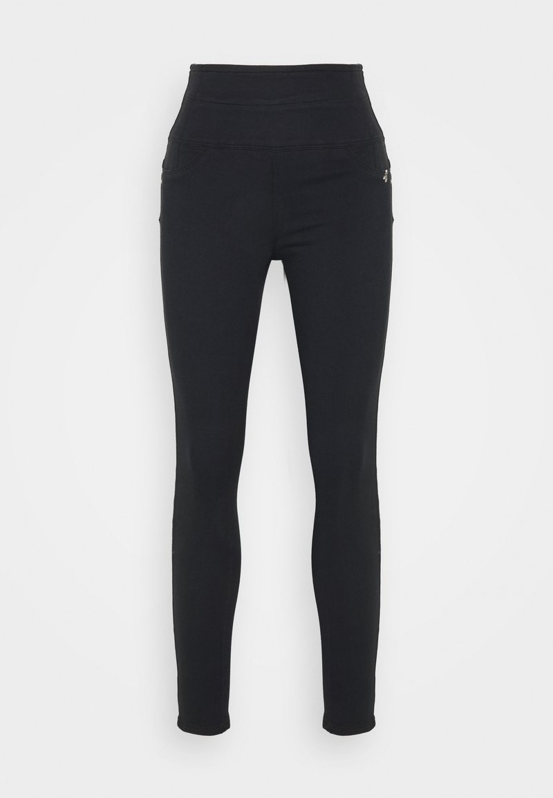 Leggings negros de talle alto fabricados en tejido elástico, con dos bolsillos laterales y costuras suaves, que se estrechan de muslo a tobillo.