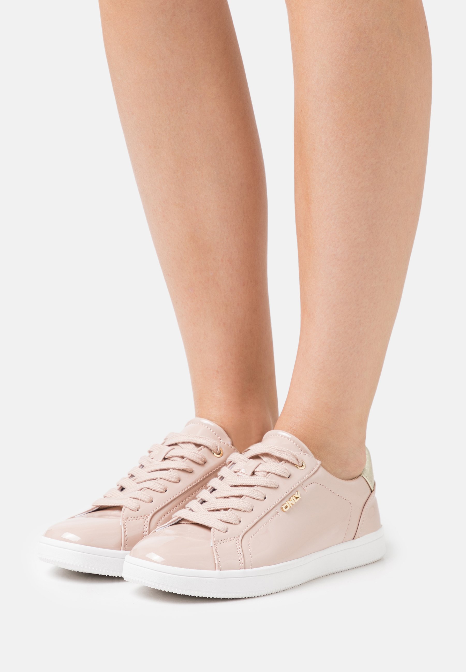 nude coloured trainers