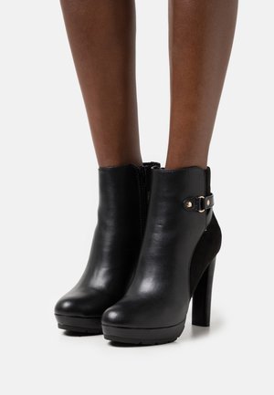 Stivaletti con plateau - black