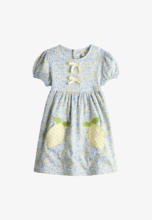 Lühikeste varrukatega beebikleidi sinise ja kollase lillemustriga, kahe kollase gingham-laimriide õmblusega rohelistes lehtedega ning kahe kreemja vatiinist paelaga rinnal.