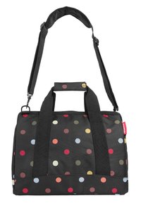 Bolso de hombro rectangular negro con lunares multicolores, dos asas, una correa de hombro acolchada y una etiqueta de marca roja en el lateral.