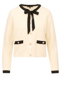 Cremefarbener Cardigan mit schwarzem Saum, verfügt über eine Schleife am Hals, zwei vordere Taschen und dekorative Knöpfe mit einem perlenähnlichen Akzent.