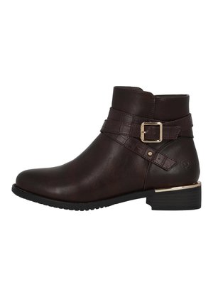 Brown leather ankle boot with a round toe, side buckle detail, and textured strap. Features a low block heel and rubber sole.