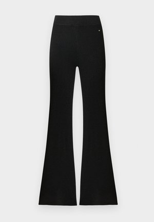 Pantalon noir évasé à côtes avec une taille lisse. Fabriqué en tissu texturé, présentant une légère brillance et un petit détail de logo.