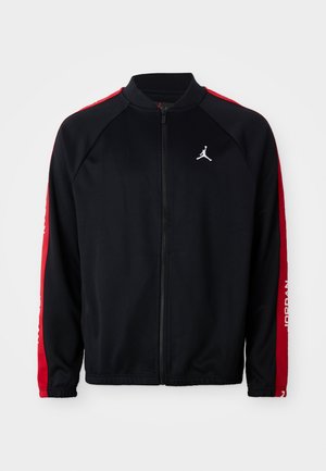 Black zip-up sports jacket with red stripes on sleeves, elastic cuffs, and white Jumpman logo on the left chest.