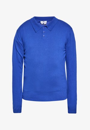 Polo de culoare albastră, cu mâneci lungi, fabricat dintr-un material tricotat moale. Dispune de un guler, trei nasturi și un tiv elastic pentru un aspect ajustat.