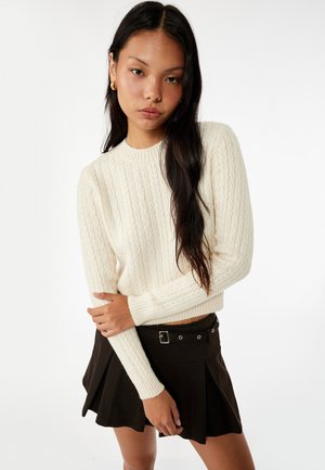 Stickad tröja - beige