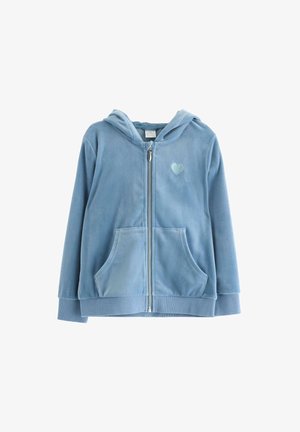 Modrá sametová mikina na zip s přední kapsou, žebrovanými manžetami a spodním lemem a malým vyšívaným detailem srdce na levé hrudi.