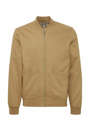 Tan bomber jacket made of textured fabric. Features a zip closure, ribbed cuffs, and two front pockets. Smooth finish throughout.